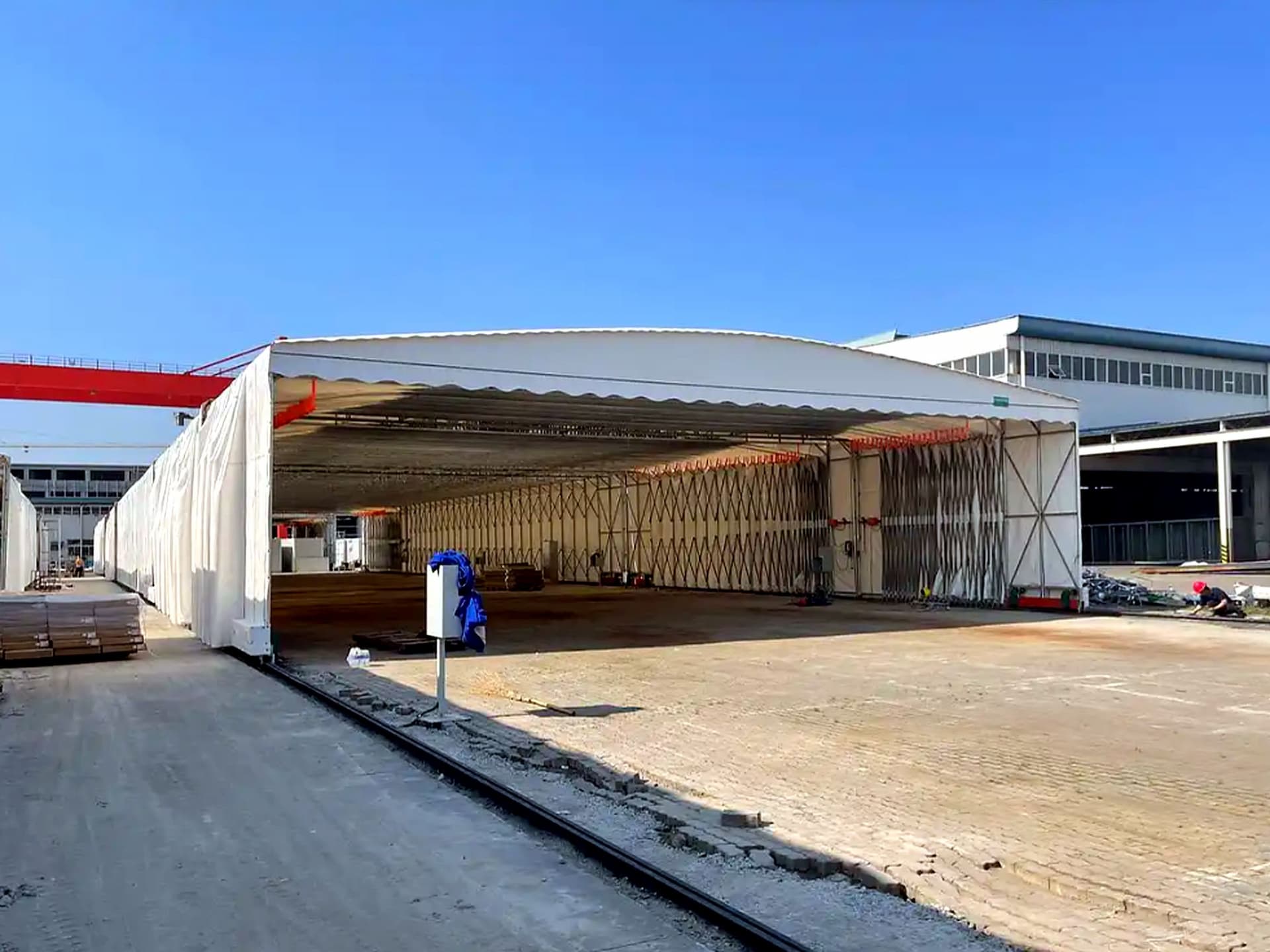 Factory loading bay — suspended canopy truck passage