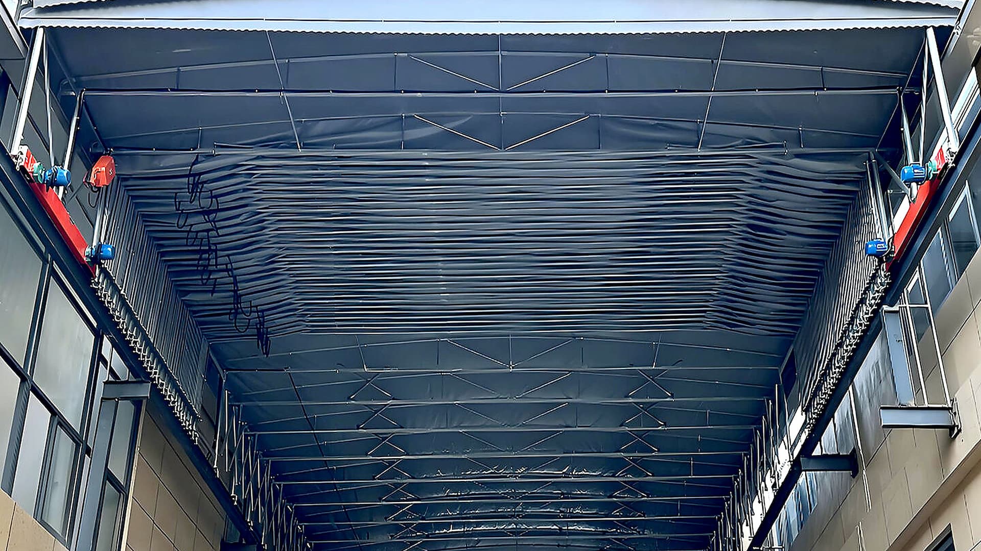 Factory passage — suspended canopy internal steel frame depth view